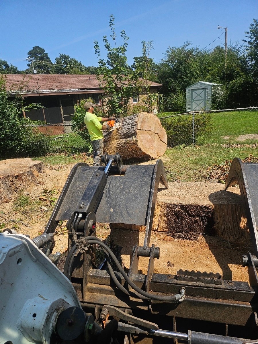 Epic equipment handling wood at a job site
